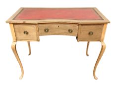 An Edwardian mahogany and satinwood inlaid lady's writing desk on cabriole legs with later plate