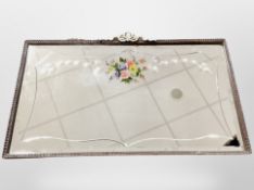 An early 20th century painted and bevelled mirror,