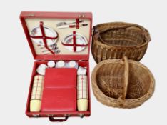 A vintage Brexton picnic hamper and two wicker baskets.