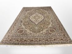 A machine-made carpet of Persian Kirman design,