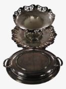 A silver-plated lidded entrée dish, together with an ornate salver and a pedestal bowl.