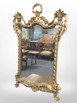 An Italian Rococo-style mirror, 46cm x 72cm.