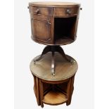 A reproduction mahogany drum table,