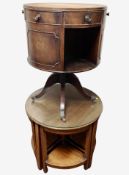 A reproduction mahogany drum table,