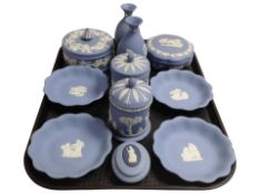 Eleven pieces of Wedgwood blue Jasperware including trinket boxes, pair of vases,