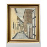 C Skousgaard : A cobbled street through a town, oil on canvas, 32cm x 39cm.