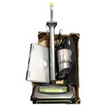 A Gtech upright vacuum cleaner, hand-held vacuum cleaner, laptop, etc.
