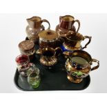 A group of stoneware and copper lustre jugs, oak tobacco jar, glassware.
