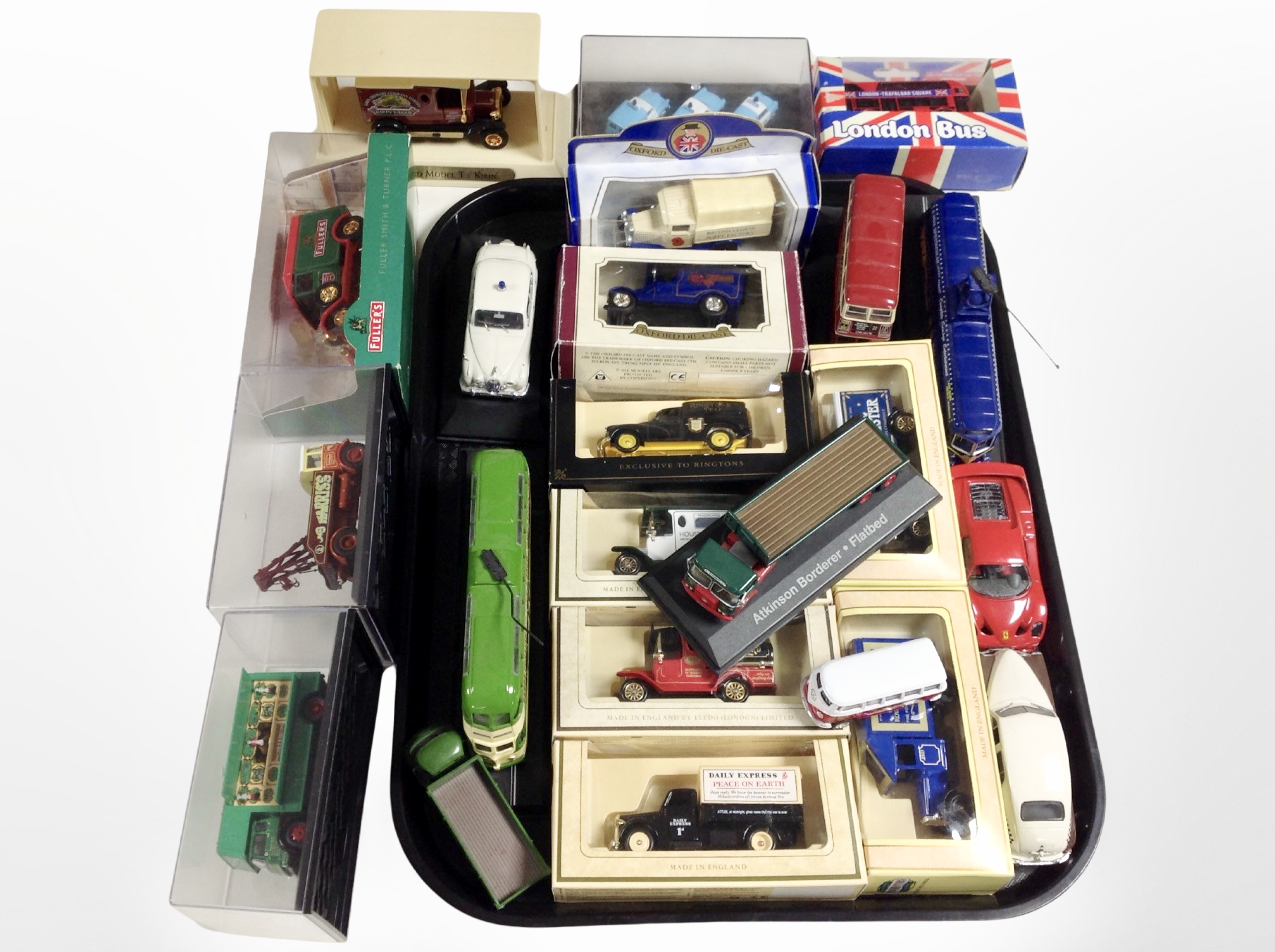 A group of diecast cars and trams including Lledo, etc.