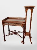 A reproduction carved mahogany occasional table in the Chinese Chippendale style,