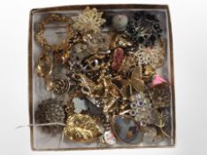 Approximately 50 vintage brooches, lapel pins, badges, some silver.