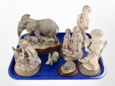 A Country Artists elephant group, together with several other figures including Armani, etc.