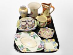 A group of ceramics including set of four Royal Winton ivory egg cups on matching stand,