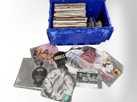 A good collection of vinyl records to include Freddie Mercury, Elton John, Madness, Depeche Mode,