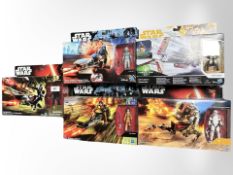 Five Hasbro Star Wars action figure sets.