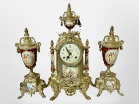 A continental gilt brass three-piece clock garniture, height 41cm.