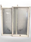Two antique etched windows in painted frames, 104cm x 59cm.