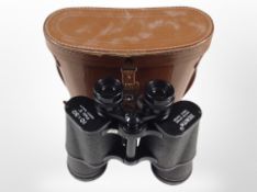 A pair of Zenith 10x50 binoculars in leather case.