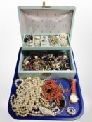 A contemporary jewellery box containing costume jewellery, dress rings, wristwatch, coral necklace,