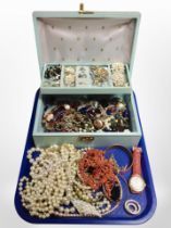 A contemporary jewellery box containing costume jewellery, dress rings, wristwatch, coral necklace,