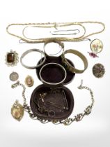 A group of silver and costume jewellery, costume brooches, gold-plated necklaces,