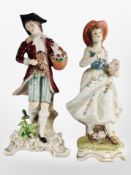 A Sitzendorf porcelain figure of a man and a similar Silesian porcelain figure of a lady,
