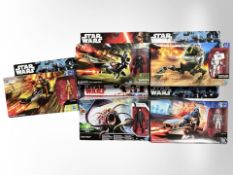Five Hasbro Star Wars action figure sets.