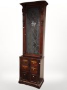 A Victorian and later mahogany apothecary cabinet fitted with cupboards and drawers,