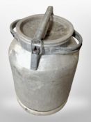 An aluminium milk churn,