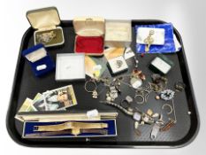 A group of jewellery including yellow metal earrings, costume pieces, wristwatches,
