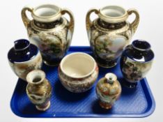 A pair of Noritake porcelain twin-handled vases and five pieces of Japanese export earthenware