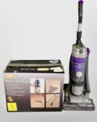 A Vax upright vacuum and another in box
