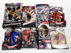A group of Hasbro and Bandai Power Rangers action figures.