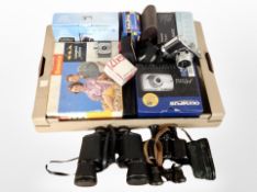 Several pairs of binoculars, digital cameras including Olympus, Canon, Brownie 44A camera outfit,