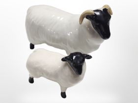 A Beswick ewe and lamb, tallest 8cm.