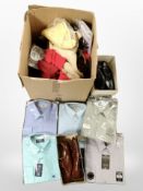 A box containing new men's dress shirts, other clothing, footwear, etc.