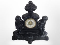 A painted ceramic mantel clock, height 35cm.