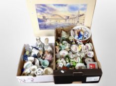 Two boxes containing assorted ceramics, continental figures, Delft shoes, glassware,