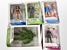 Five DC Collectables figures including Catwoman, Wonder Woman, etc., boxed.