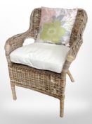 A wicker conservatory chair