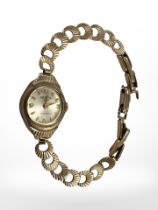 A lady's 9ct gold Medana wristwatch on 9ct gold bracelet CONDITION REPORT: 7.