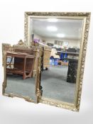 Two gilt-framed mirrors, largest 91cm x 60cm.