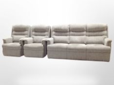 A contemporary three piece lounge suite in grey upholstery