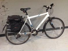 A Falcon Storm bike with rear panniers,
