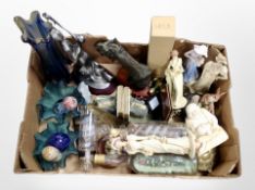 A box of figurines, ships in bottles, art glass vase, glass paperweights.