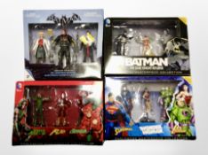 Three Eaglemoss action figure sets, all containing DC characters,