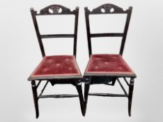 A pair of Edwardian ebonised occasional chairs with ER 1902 carved to the back rests