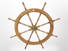 A wooden ship's wheel, diameter 122cm.