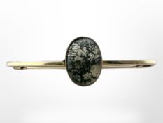 A 9ct gold moss agate bar brooch, width 43mm. CONDITION REPORT: 2.