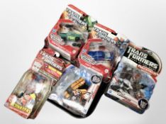A group of Hasbro Transformers action figures.